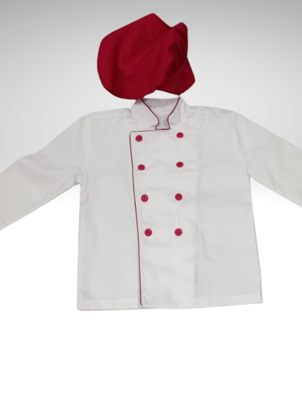 Relish Reimagined kids' chef jacket in white twill with red piping and buttons, paired with matching red mushroom hat.